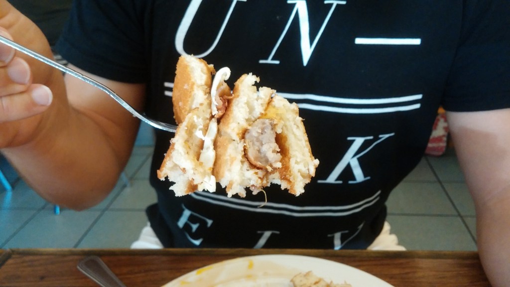 The proper way to eat the Bill-Dozer.